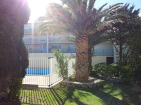 Appartement RDC avec Terrasse dans residence avec piscine et face à la plage